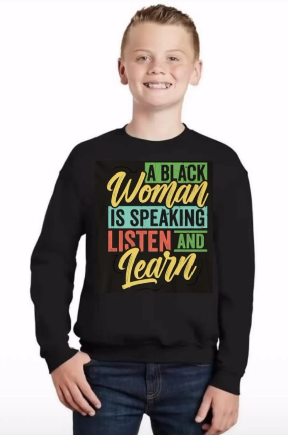 a black woman is speaking listen and learn.png