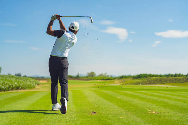 asian-man-golfing-on-the-course-in-summer.jpg