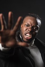 very-angry-black-man-telling-you-stop-with-open-hand-fighting-his-rights-close-up-black-backgr...jpg